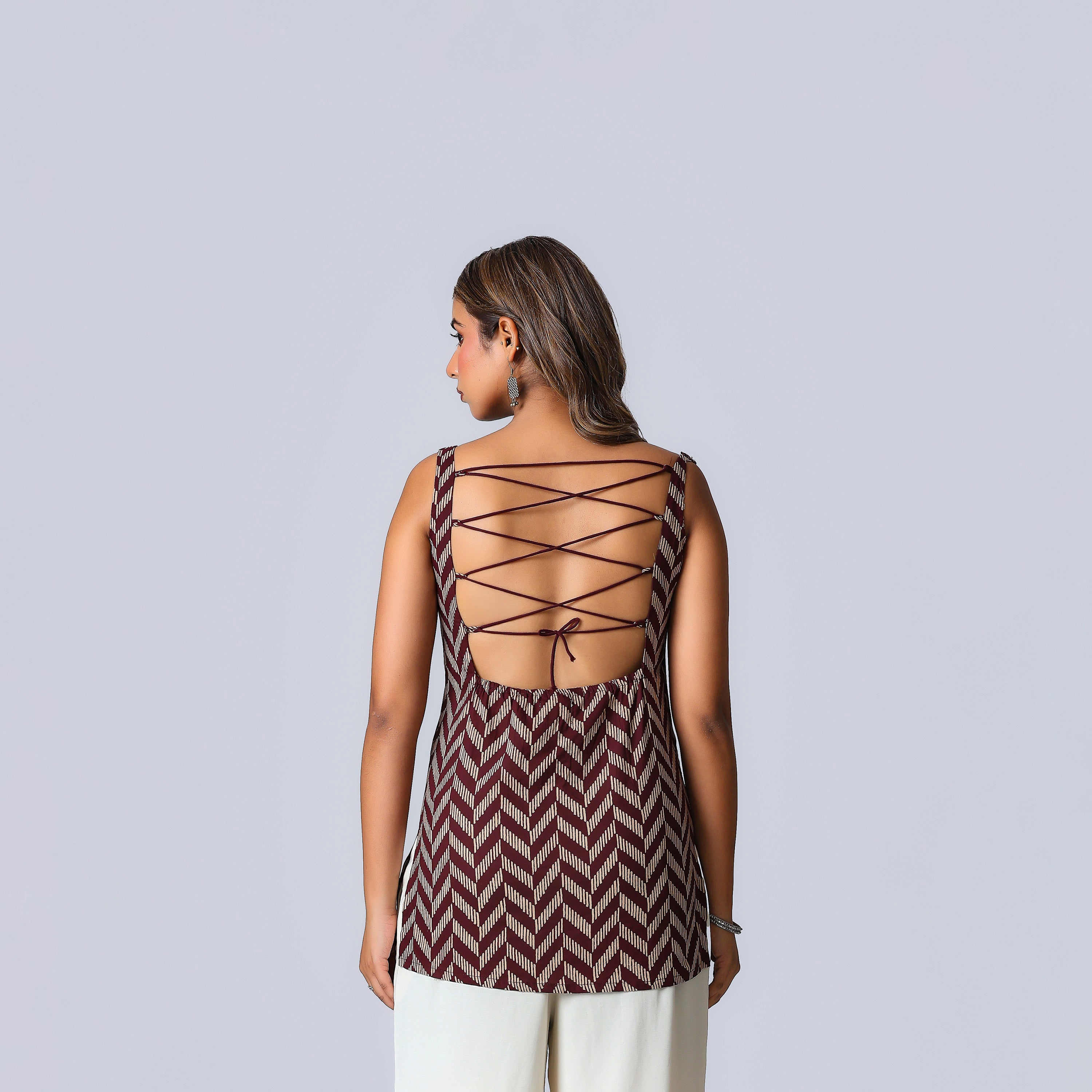 REET -  BACKLESS KURTI